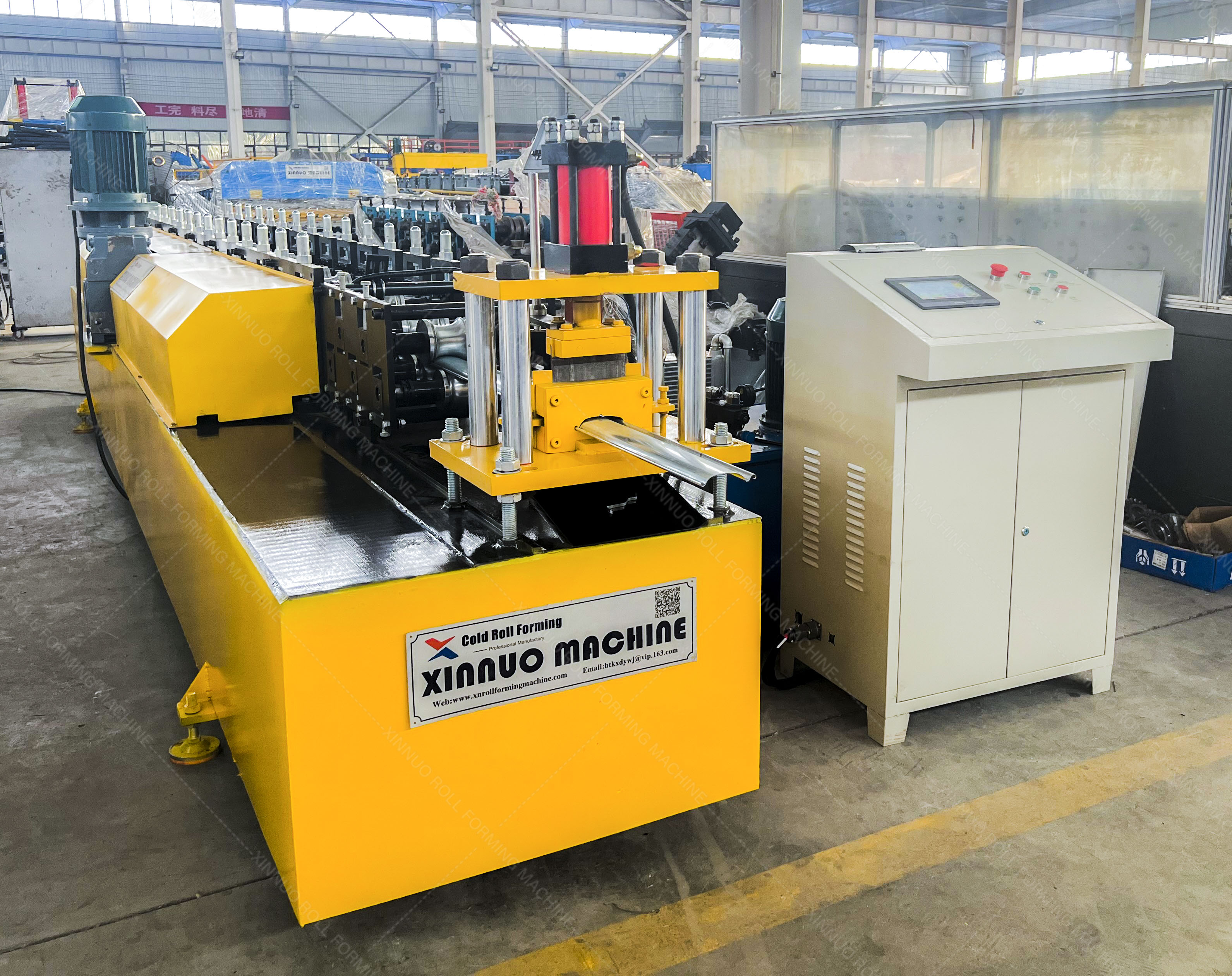 Roller shutter door rolling forming machine