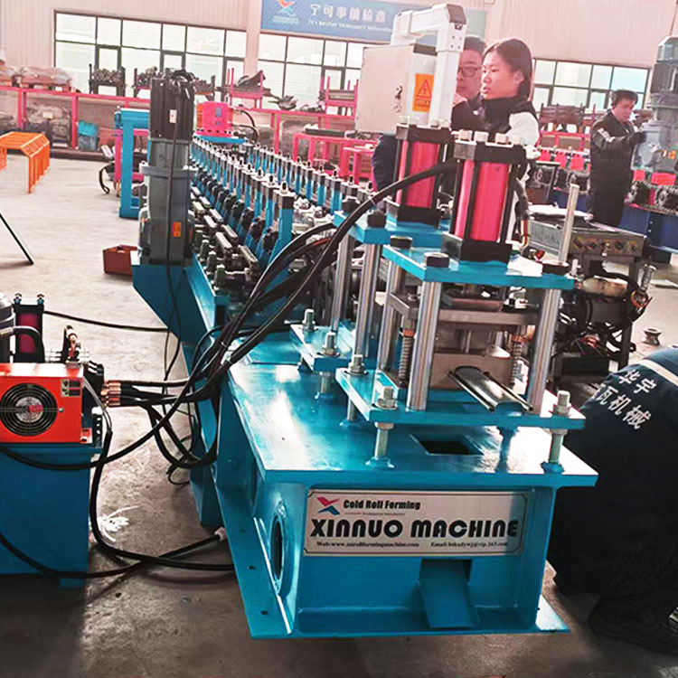 Rolling shutter door forming machine