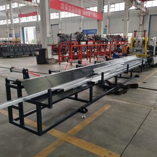 Pneumatic receiving rack for purlin machine