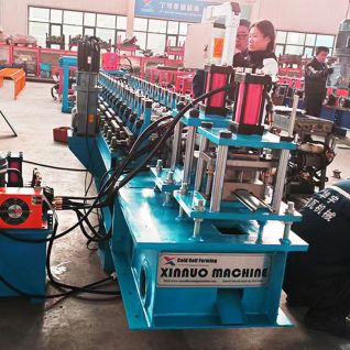 Rolling shutter door forming machine